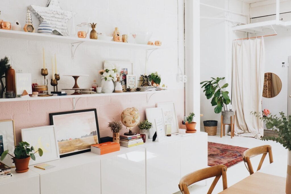 white wooden shelf and decors